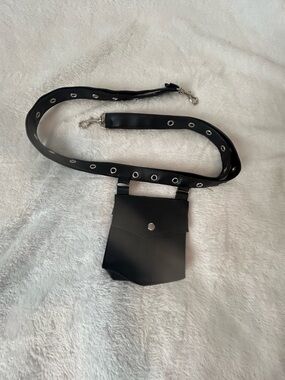 Black Removable grommet strap with silver hardware.and mini bag punk-style